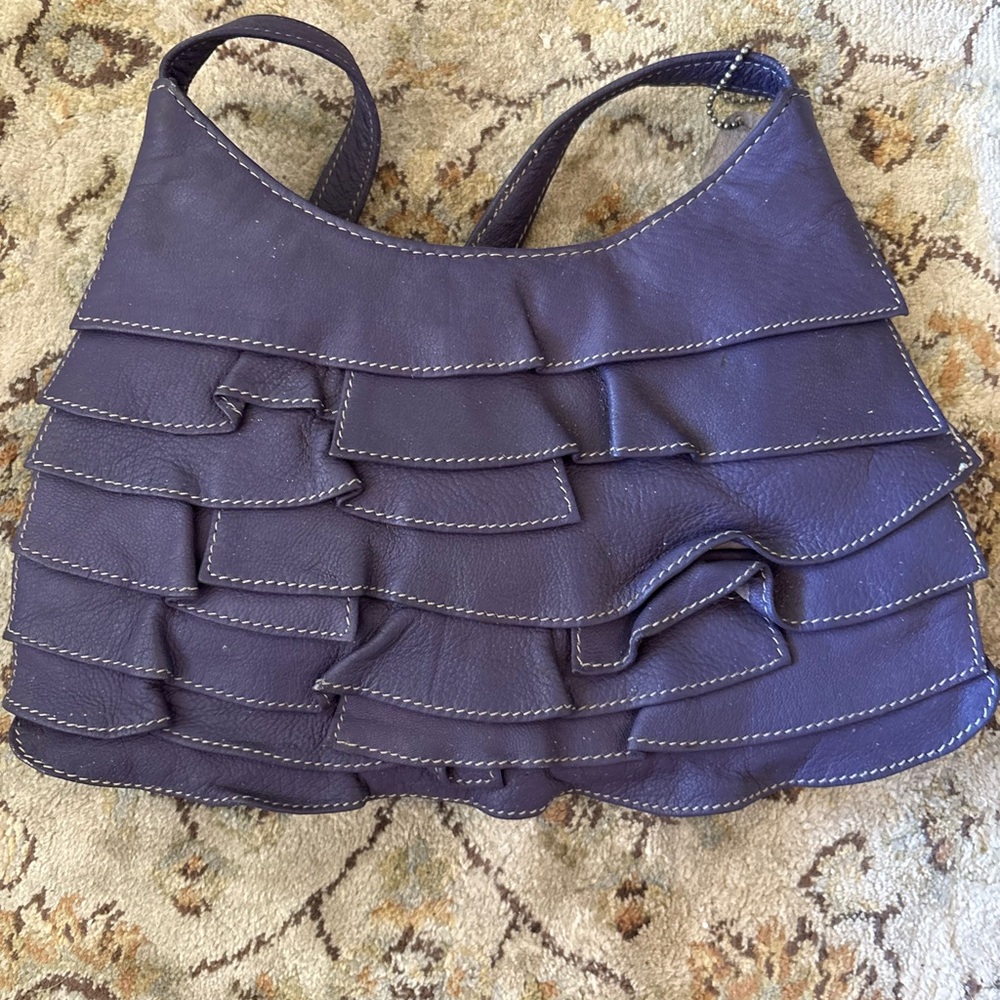 Purple leather ruffled handbag clutch